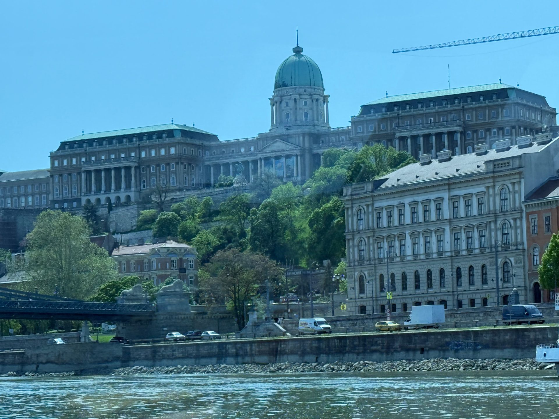 Buda Castle above the Danube seen from a river cruise in Budapest