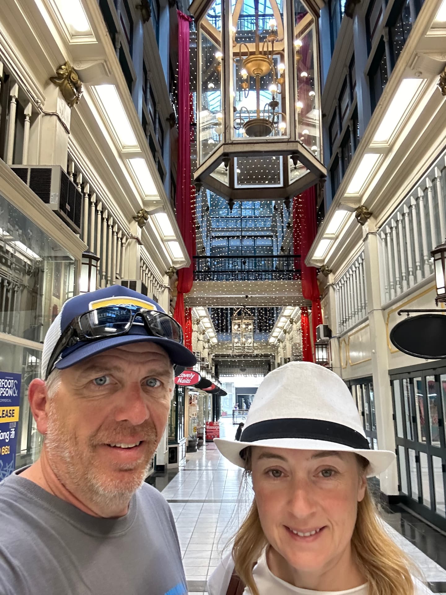 Natalia and her husband inside a historic Auckland shopping arcade