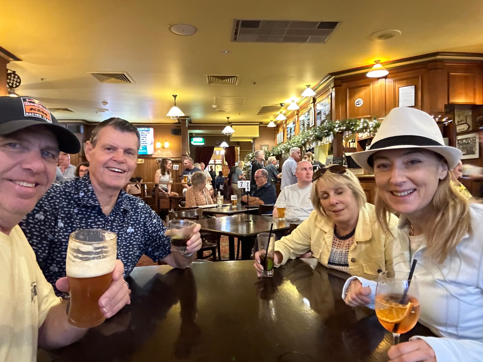 Toasting drinks with friends in a classic Sydney pub
