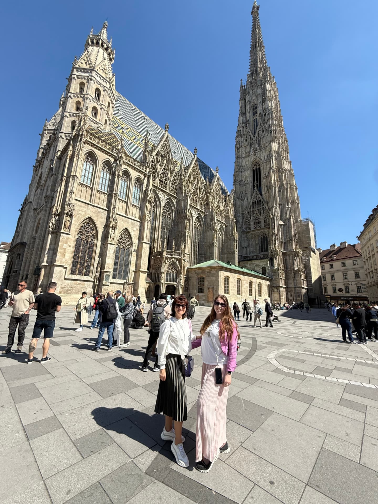 Standing in front of St. Stephen's Cathedral in Vienna on a clear day
