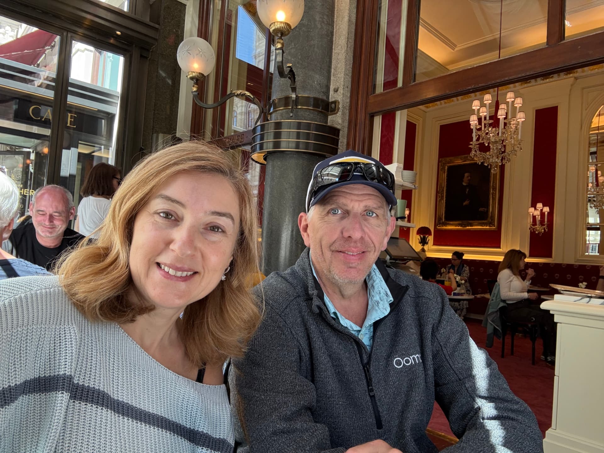 Natalia and her husband at a historic Viennese coffee house